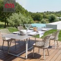Emma Varaschin Sillon patas de aluminio asiento de tela
