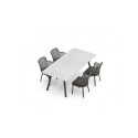 Emma Varaschin Sillon patas de aluminio asiento de tela
