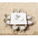 Emma Varaschin Sillon patas de aluminio asiento de tela