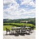 Emma Varaschin Sillon patas de aluminio asiento de tela