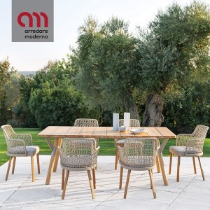 Emma Varaschin Sillon patas de madera asiento de tela
